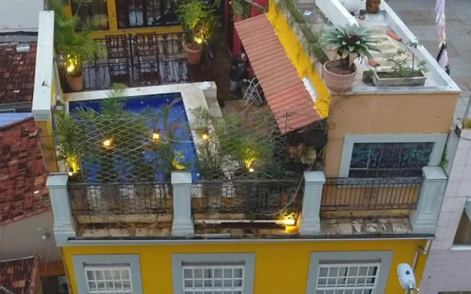 Exterior view of the Sofound Mansion and its pool courtyard